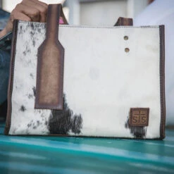 STS COWHIDE RUBY PURSE -Johnny Corral Shop STS30235 cowhide ruby purse lifestyle 2 600x 259c1586 3770 4524 a298 06d234696cab